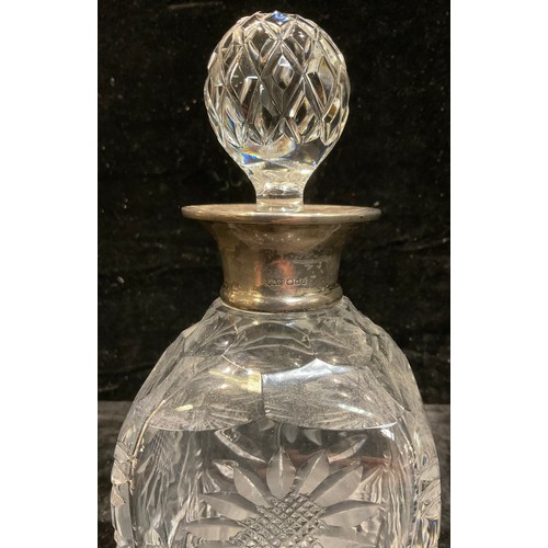 31 - A silver mounted cut glass decanter, London 1963