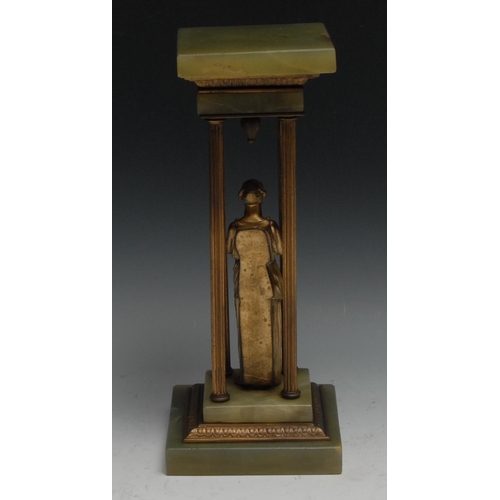 53 - A late 19th century gilt metal and green onyx library portico, with a Classical female figure within... 