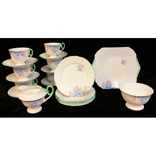 63 - A Shelley pink and blue floral pattern tea service for six comprising cake plate, side plates, cream... 