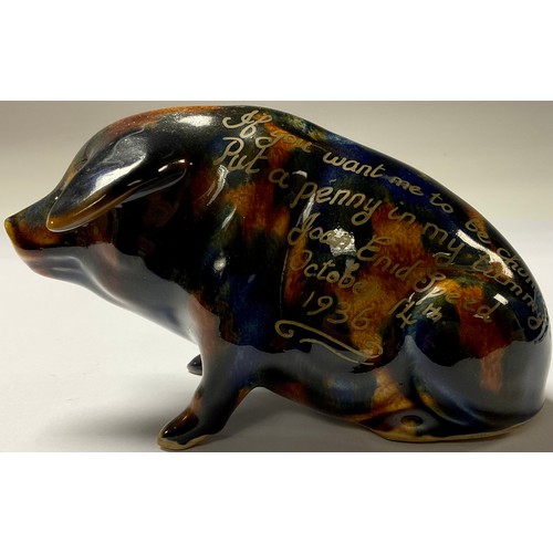 69 - A Denby majolica pig money box, seated, 9cm high, inscribed in gilt, If you want me to be chummy, Pu... 