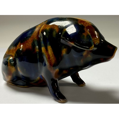 69 - A Denby majolica pig money box, seated, 9cm high, inscribed in gilt, If you want me to be chummy, Pu... 