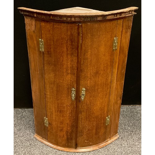 178 - A George III oak mahogany banded bow front corner cabinet, moulded cornice, brass H hinges, 98.5cm h... 