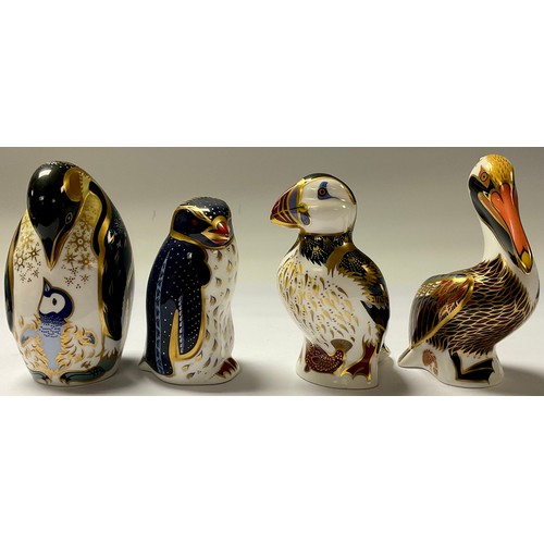 75 - A Royal Crown Derby paperweight, Penguin and Chick, silver stopper; others, Puffin, Brown Pelican, R... 