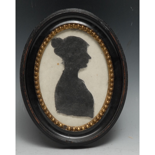 93 - English School (19th/early 20th century), a silhouette, of a young lady, bust length in profile, ova... 