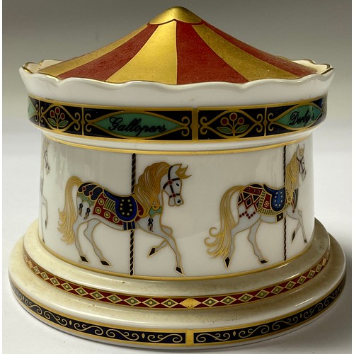 103 - A Royal Crown Derby Treasures of Childhood Carousel Money Box, second quality; a Mini Rag Doll, firs... 