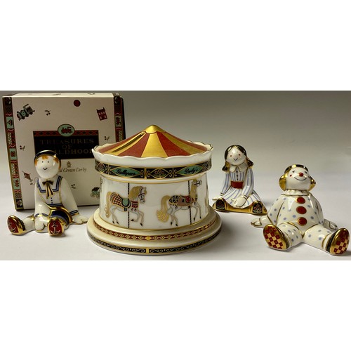 103 - A Royal Crown Derby Treasures of Childhood Carousel Money Box, second quality; a Mini Rag Doll, firs... 