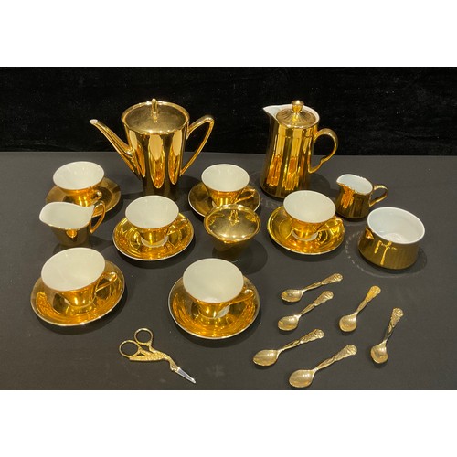 106 - A Johann Feltmann Vohenstraub Bavarian gilt decorated coffee service; a Royal Worcester gilt decorat... 