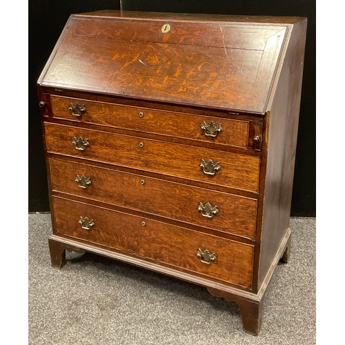 184 - A George III inlaid oak bureau, the fall front with Swan patera, enclosing an arrangement of small d... 