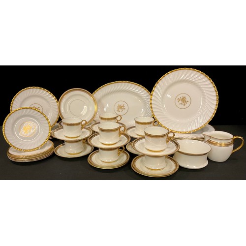 120 - A Mintons Gold Rose pattern dinner service for six comprising dinner plates, dessert plates, side pl... 