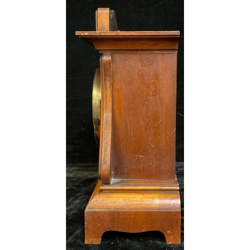 123 - A continental Art Nouveau mahogany mantel clock, arched case worked with tooled scrolling stems, sil... 