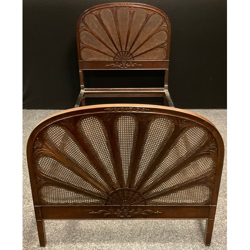 186 - An early 20th century mahogany framed bergere caned single bed, Fan shaped head and foot boards, 119... 