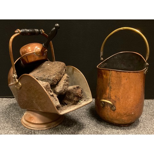 190 - A Victorian copper helmet shaped coal/log bucket and shovel, tapering arched opening, circular foot,... 