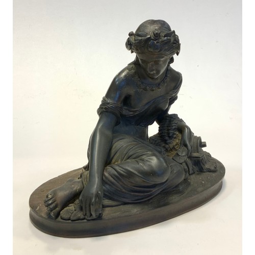 144 - French School (19th century), a dark patinated bronze, of a Classical muse, oval base, 23.5cm wide