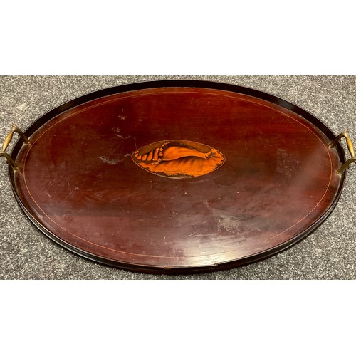 193 - A large 19th century mahogany oval gallery tray, the field inlaid with a navette shaped shell patera... 