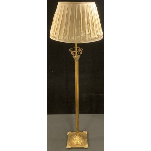 237 - An early 20th century brass Corinthian column floor lamp