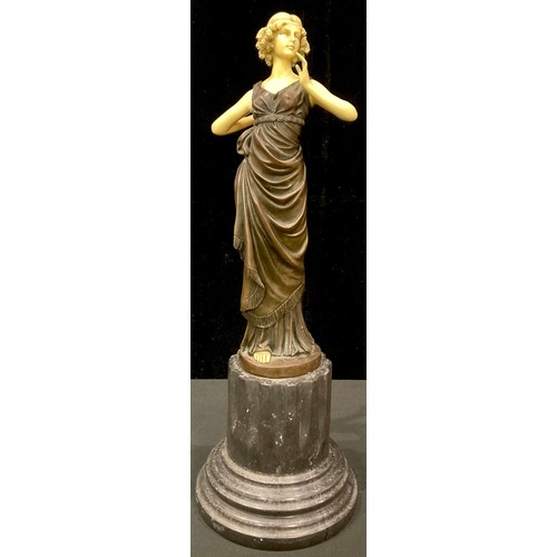 253 - An Art Deco style bronzed metal sculpture, Flapper Girl, 43cm high