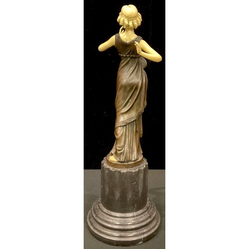 253 - An Art Deco style bronzed metal sculpture, Flapper Girl, 43cm high