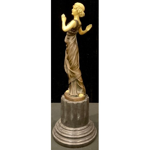 253 - An Art Deco style bronzed metal sculpture, Flapper Girl, 43cm high