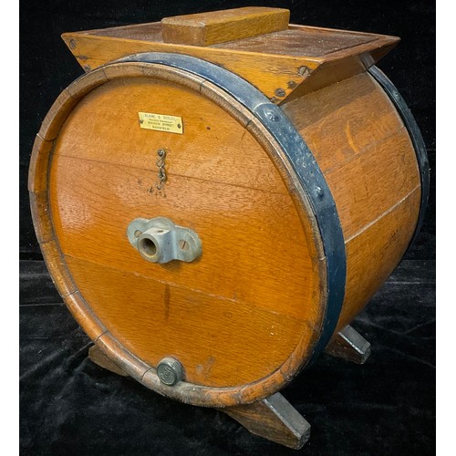 287 - An early 20th century oak butter churn, by Blake & Beeley, Mansfield