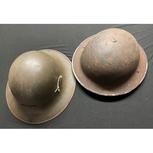 289 - WW2 British MK II Helmet with black home front overpaint complete with size 7 1/4 liner and chinstra... 