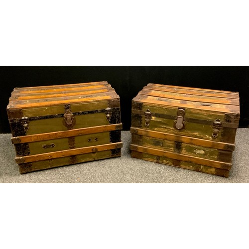 182 - A pair of military officers metal bound wooden travel trunks, 53cm high, 77cm long, 48cm deep (2)