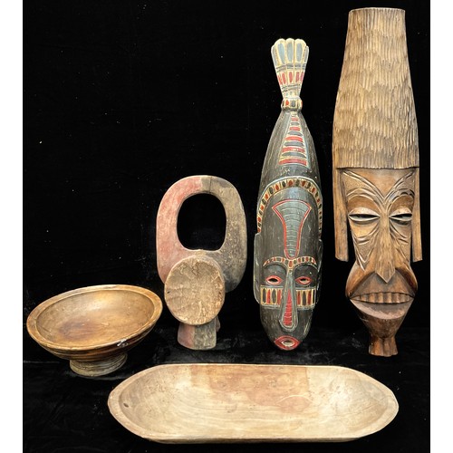 333 - Tribal Art - an elongated African mask, 85cm high;  another; turned bowls; etc (5)