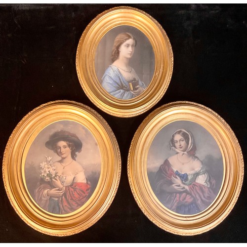 335 - A set of three early 19th century hand tinted oval portrait engravings, ladies of fashion, 28cm x 23... 