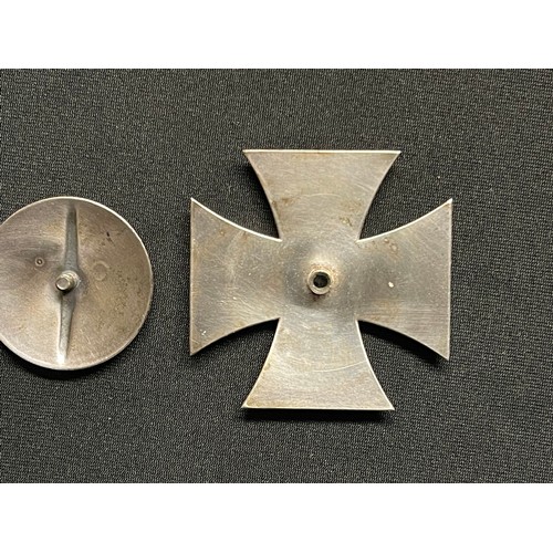 342 - Reproduction WW2 Third Reich Iron Cross 1st class. One piece construction. Screwback with maker mark... 