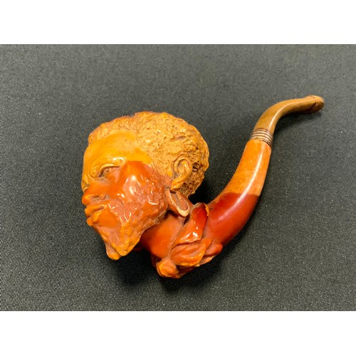 233 - A 19th century meerschaum pipe, carved with Moor's head, 13.5cm long, cased, c.1890