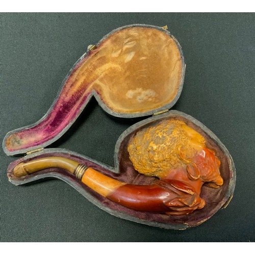 233 - A 19th century meerschaum pipe, carved with Moor's head, 13.5cm long, cased, c.1890