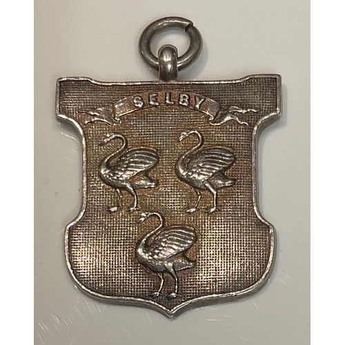 419 - A Victorian silver armorial fob, Birmingham 1897