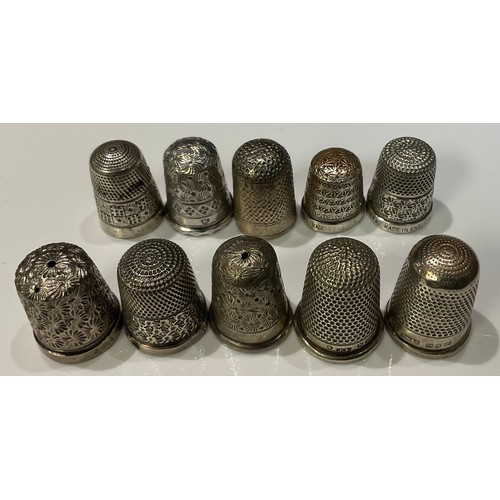 420 - Ten silver thimbles