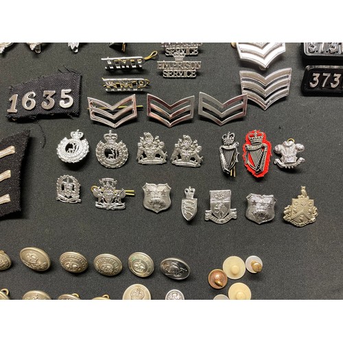 432 - A collection of British Police insignia, buttons, numerals, enamel badges etc to include: a Greater ... 