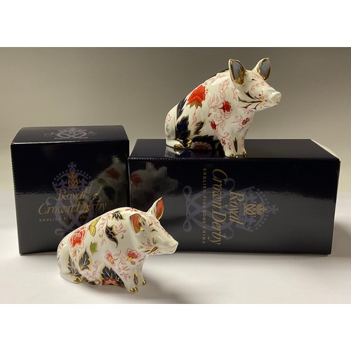 5006 - A Royal Crown Derby paperweight, Pig Money Box, gold stopper, 12cm, boxed; another, Sitting Pig, gol... 