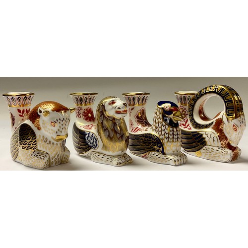 5032 - A set of four Royal Crown Derby candle holders, Goat, Gryphon, Lion and Bull, 9cm, printed marks, ea... 
