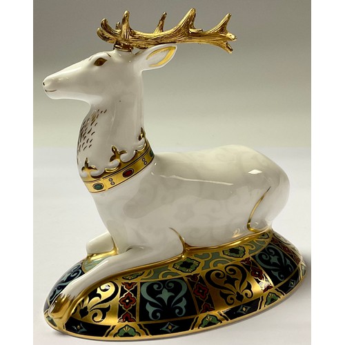 5034 - A Royal Crown Derby paperweight, The White Hart Heraldic Stag, limited edition 93/2,000, gold stoppe... 