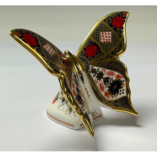 5042 - A Royal Crown Derby paperweight, Old Imari Solid Gold Band Butterfly, celebrating the Golden Anniver... 
