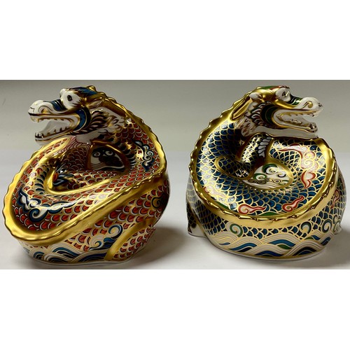 5047 - A pair of Royal Crown Derby paperweights, The Dragon of Good Fortune and The Dragon of Happiness, ex... 