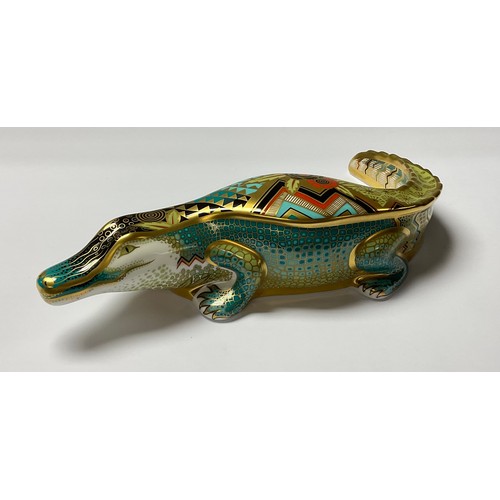 5050 - A Royal Crown Derby paperweight, Alligator, gold stopper, 26cm long, printed marks in red, boxed