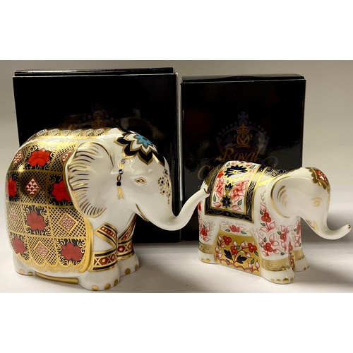 5070 - A Royal Crown Derby paperweight, Imari Elephant, silver stopper, 10.5cm, printed mark in red, boxed;... 