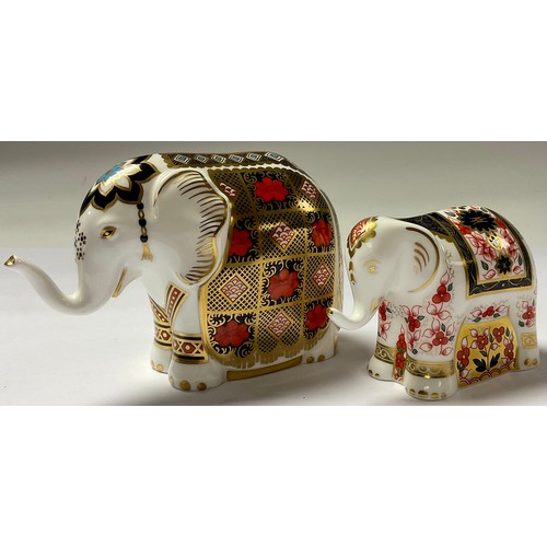 5070 - A Royal Crown Derby paperweight, Imari Elephant, silver stopper, 10.5cm, printed mark in red, boxed;... 