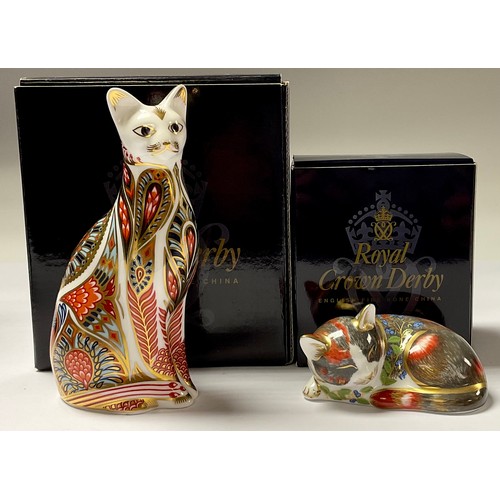 5082 - A Royal Crown Derby paperweight, Siamese cat, gold stopper, 13cm, printed mark in red, boxed; anothe... 