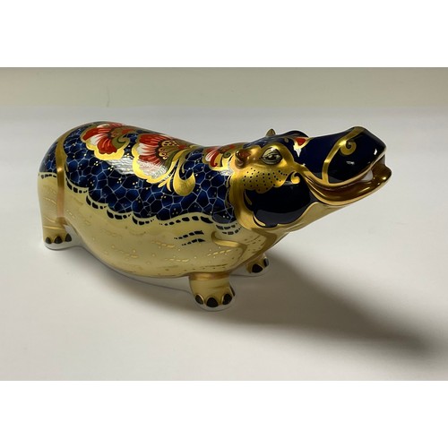 5095 - A Royal Crown Derby paperweight, Hippopotamus, gold stopper, 20cm long, printed mark in red