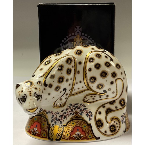 5101 - A Royal Crown Derby paperweight, Snow Leopard, silver stopper, 16cm long, printed mark in red, boxed