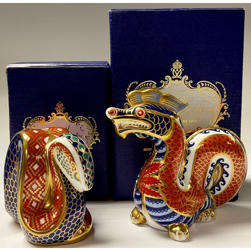 5104 - A Royal Crown Derby paperweight, Dragon, gold stopper, 12cm, printed mark in red, boxed; another, Sn... 