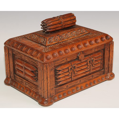 13 - An unusual hardwood rectangular cigar box, carved and surmounted with bundles of cigars, 30cm wide, ... 