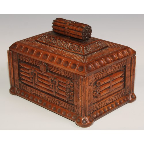 13 - An unusual hardwood rectangular cigar box, carved and surmounted with bundles of cigars, 30cm wide, ... 