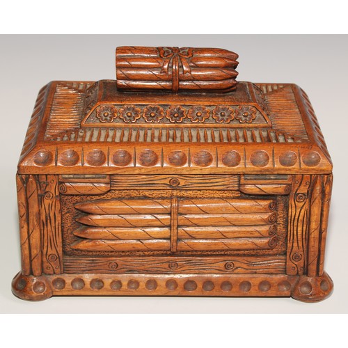 13 - An unusual hardwood rectangular cigar box, carved and surmounted with bundles of cigars, 30cm wide, ... 