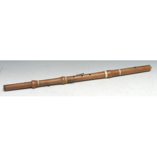 648 - An early 19th century boxwood flute, by Potter, London, of sectional construction, silvered keys, 68... 