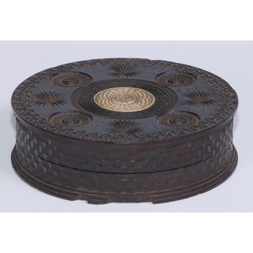 655 - An early 19th century engine turned lignum vitae table snuff box, the push-fitting cover centred by ... 